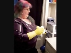 BBW in latex and gloves cleans the defecate