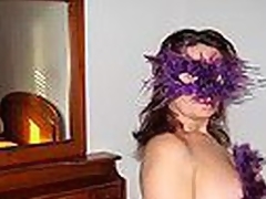 Beamy Spanish mature woman in the matter for cute bra with multicolor heart shaped patterns blows dong wearing a bizarre violet feather mask plus listening to Santana's rendition for 'Black Magic Woman'.